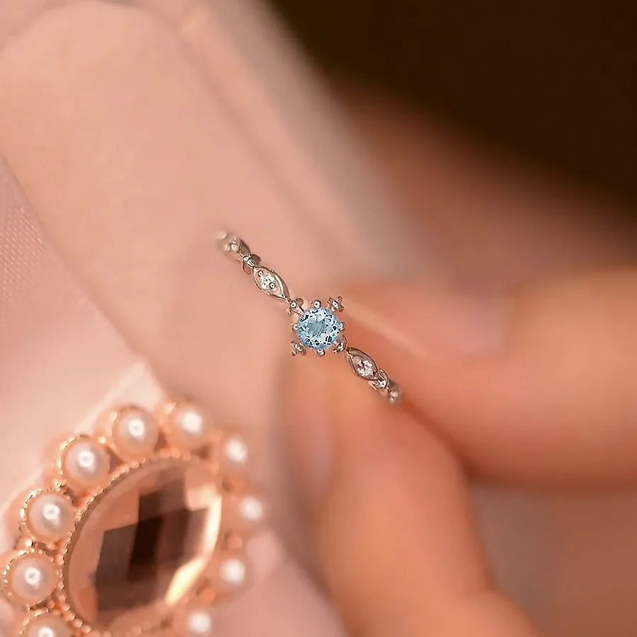 Sky Blue Topaz Opening Ring