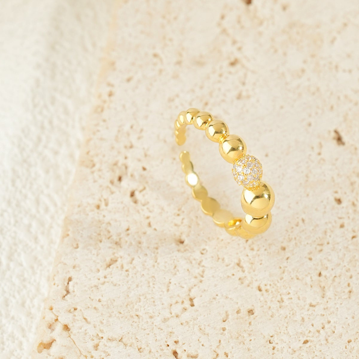 Round Zirconia Golden Plated Open-ended Ring