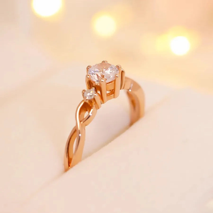 Twisted Trilogy Moissanite Ring