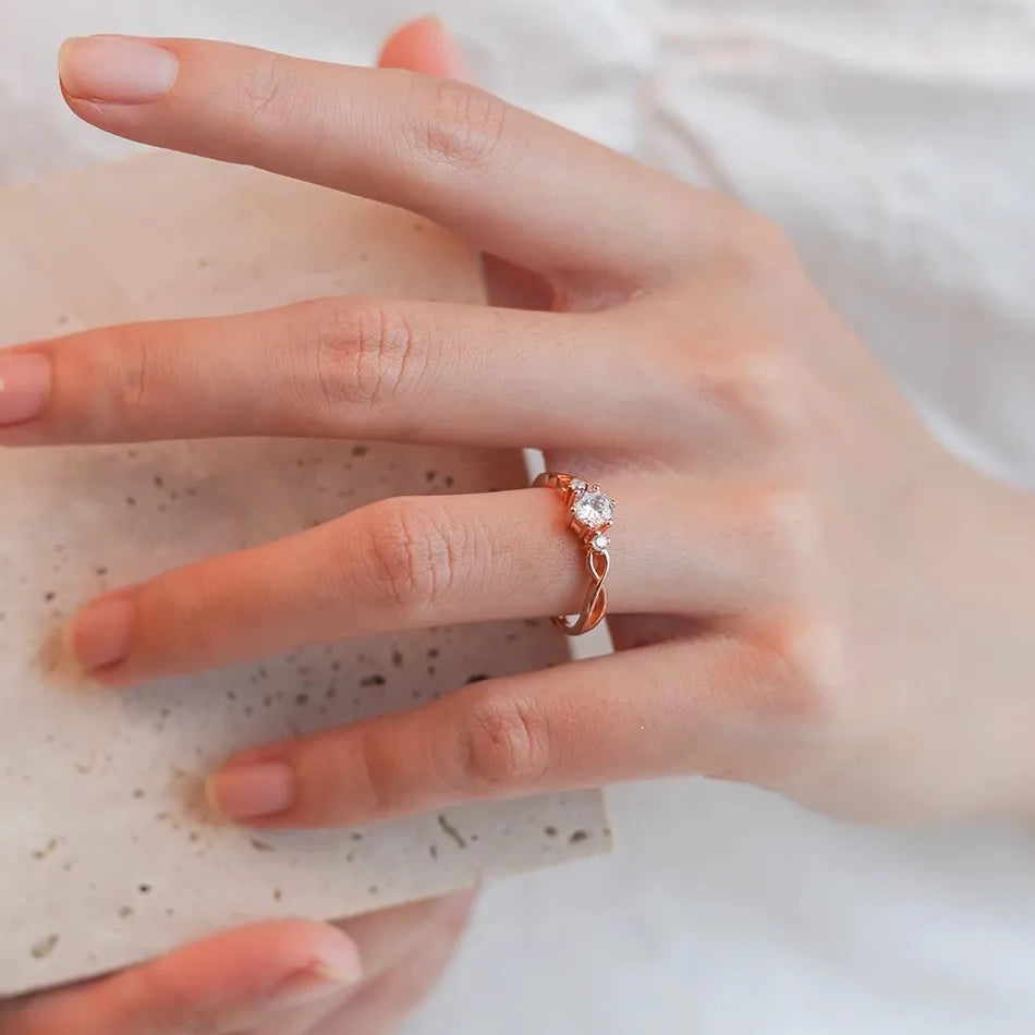 Twisted Trilogy Moissanite Ring