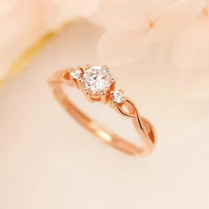 Twisted Trilogy Moissanite Ring