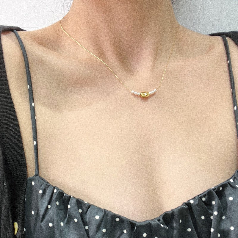 Gilded Copper Necklace with Delicate Pearl Accents