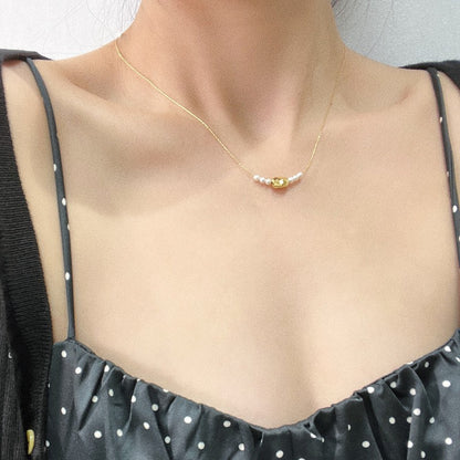 Gilded Copper Necklace with Delicate Pearl Accents