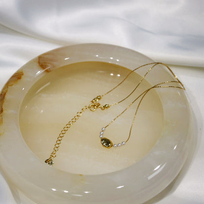 Gilded Copper Necklace with Delicate Pearl Accents