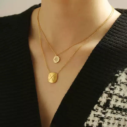Gold Plated Necklace with Star Embellished Medallion Pendant