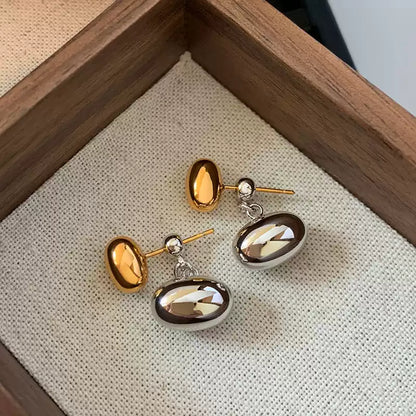 Elegant Gold and Silver Oval Drop Earrings