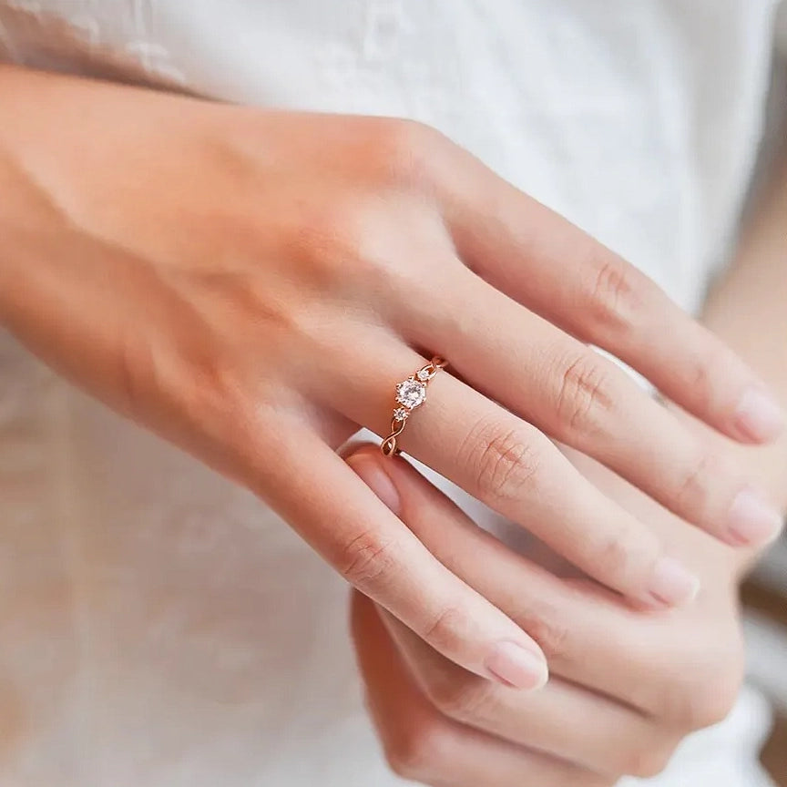Twisted Trilogy Moissanite Ring
