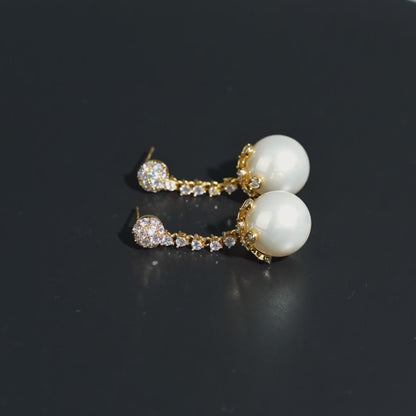 Radiant Pearl Dangle Earrings